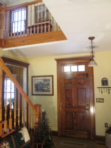 We built this foyer entrance stair case with 6x6 raised panel newel posts in Quakertown.