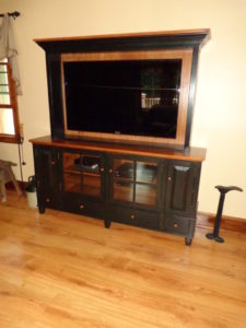 A custom built entertainment cabinet with two-tone finish for a home in Quakertown, PA.