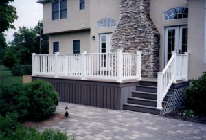 A deck we built in Center Valley, PA with Trex Select Winchester Grey decking and a deck skirt.