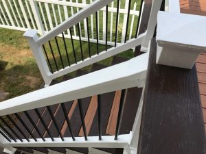 A T-railing with two-tone stairs built on a home in Perkasie, PA.
