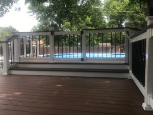 Low maintenance Trex Deck with stairs to pool with locking gate built in Quakertown.