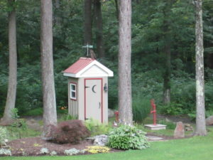 We built this Functional garden outhouse complete with electric in Quakertown, PA.