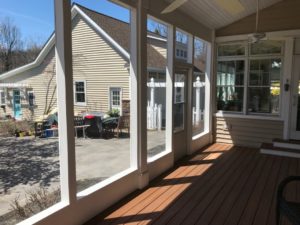 We created this screened-in porch, Trex decking and beaded board ceiling for a project in Coopersburg, PA.