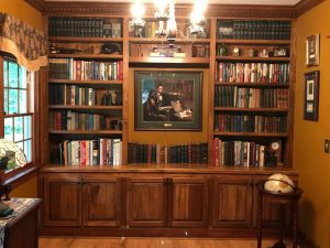 This custom library with adjustable shelves and raised panel base cabinets was built and installed in a home in Quakertown, PA.