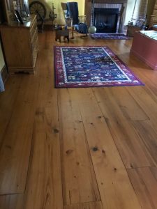 This antique style wide plank, cypress hardwood flooring was installed with cut nails in a home in Ferndale, PA.