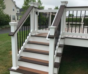 Composite Deck Stairway Trex Transcends "Tiki torch"  with "Woodland brown" accents in Perkasie, PA.