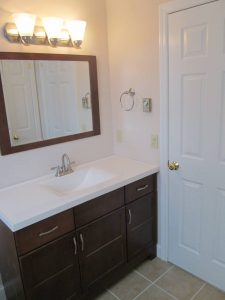 We updated the flooring, lighting, fixtures and cabinetry on this complete bathroom renovation we did on a home in Quakertown, PA.