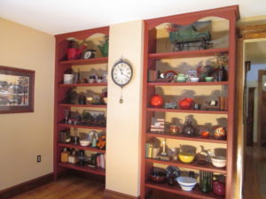 This is a custom built-in unit with adjustable shelves located in a beautiful colonial home in Quakertown, PA.