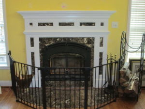 A Custom mantel with marble backing and threshold built on a home in Kitnersville, PA.