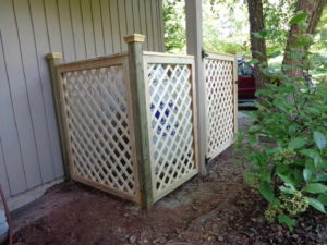 This project we created a decorative structure to hide unsightly utilities for property owner in Ottsville, PA.