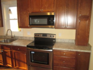 Kitchen Renovation - Maple cabinets with Formica counter top with hardwood flooring in Quakertown PA