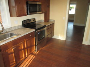 Kitchen Renovation - Maple cabinets with Formica counter top with hardwood flooring in Perkasie, PA.