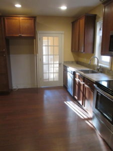 Kitchen Project - Maple cabinets with Formica counter top with hardwood flooring in Perkasie, PA.