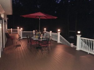 Composite Trex Transcends "Tree House" with 6x6 rail posts with 110 volt lamp lighting operated with dimmer switch for great dinning experience in Quakertown, PA.