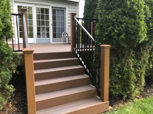 Fiberon staircase with Trex Reveal aluminum railing on home deck in Raubsville