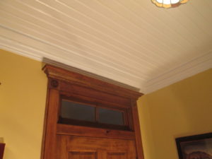 A unique powder room door with transom located in Quakertown, PA.