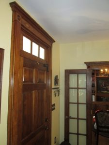 Oak front door with transom on a home in Quakertown, PA.