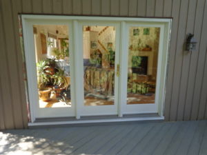 An Andersen triple custom french door opening to a deck on a home we worked on in Ottsville, PA.