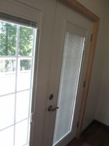 This is a job in Spinnerstown, PA. to install a french door with custom blinds between glass.