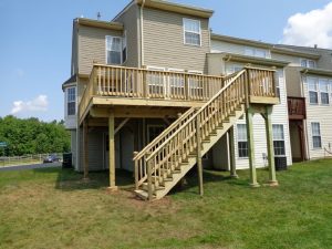 A second story pressure treated deck constructed in Quakertown, PA.