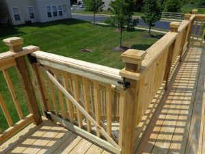 Pressure treated deck with decorative posts and locking gate located in Richlandtown, PA
