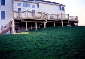 We built this large pressure treated deck on sloping ground in Plumsteadville, PA.