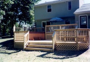 A Pressure Treated deck with hot tub access built in Plumbsteadville, PA.
