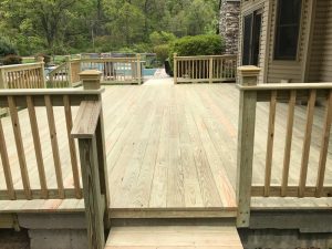 This A pressure treated deck with in ground pool access was built in Riegelsville, PA.