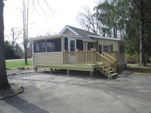 A project to build a cottage with screened in porch and pressure treated deck in Nockamixon, PA