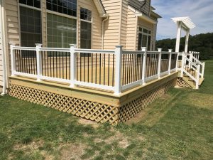 A pressure treated deck with lattice built in Riegelsville, PA.