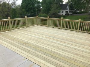 A pressure treated deck job with decorative railing we built in Perkasie, PA.