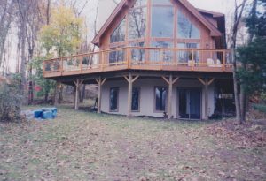 Cedar deck project with tubular balusters located in Kintnersville PA.