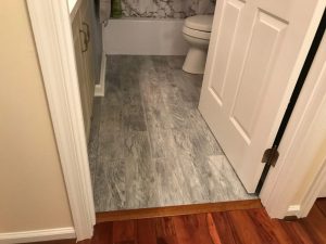 We constructed a bathroom floor using wood-style ceramic tile for a home in Center Valley, PA.