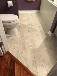 We put this bathroom floor with wood-style ceramic tile in a home we were working on located in Center Valley, PA.